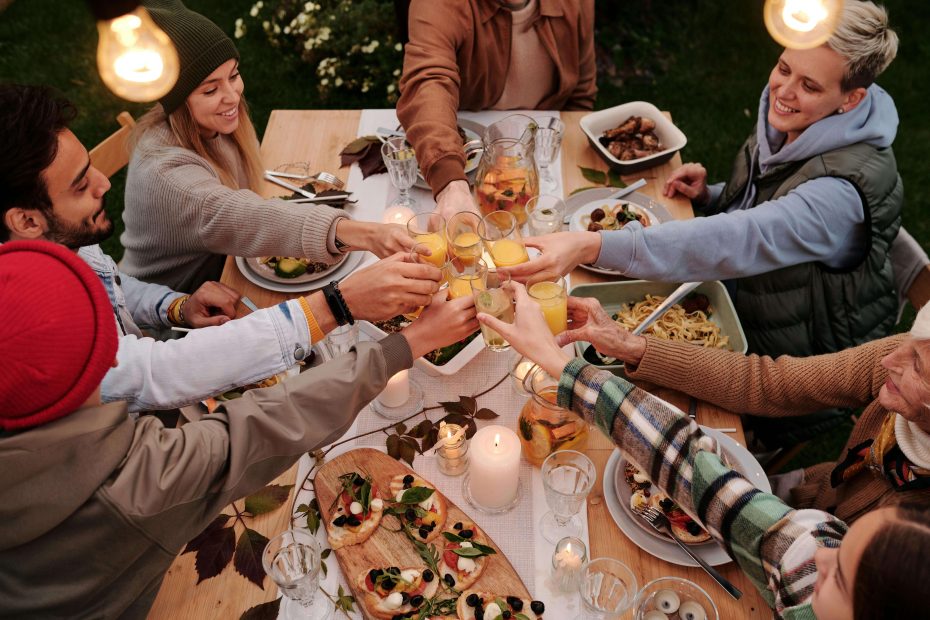 Digital nomads sharing a meal in a sustainable coliving community